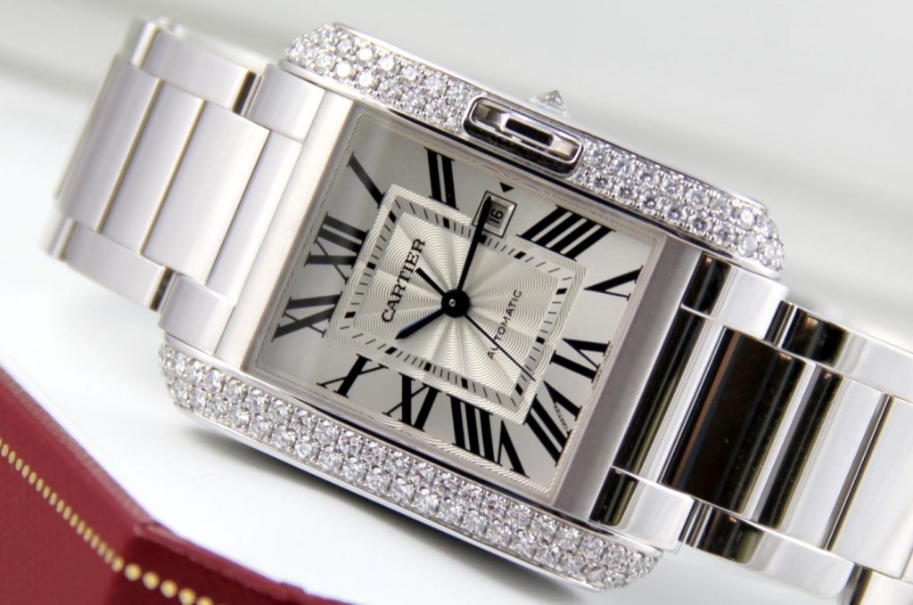 The stainless steel fake watches are decorated with diamonds.